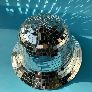 Disco style bucket hat with sparkling silver mirror tiles on a bright blue background