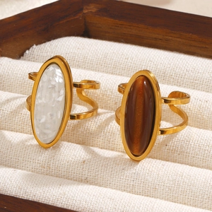 Minimalist stainless steel oval rings with tiger eye and white shell inlays