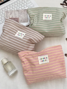Chic striped canvas makeup bags in assorted colors with spacious zipper design
