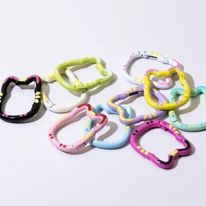 Colorful cat-shaped metal spring snap hooks with polka dot patterns for DIY keychains