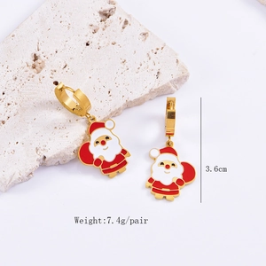 Detail of Santa Claus earrings showing 3.6cm height and 7.4g weight on stone base