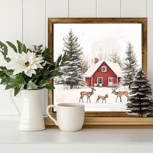 Nordic wooden Christmas frame with watercolor winter snow scene and reindeer on a desk