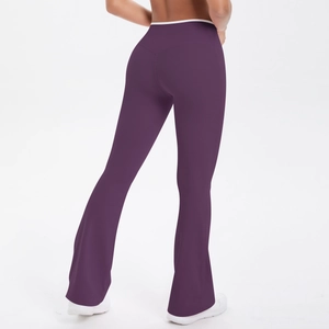 Close-up of high-waist yoga flare pants in deep purple with white contrast waistband