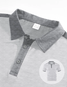 Vue détaillée de la texture du polo en piqué gris avec col et étiquette de taille M