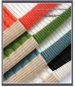 Macro detail of cable knit and ribbed fabric texture in multiple warm sweater colors