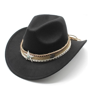 Detail of black cowboy hat featuring a turquoise star emblem and decorative leather cords