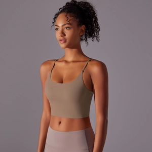 Detail of high-impact sports bra with thin straps and supportive wide underband