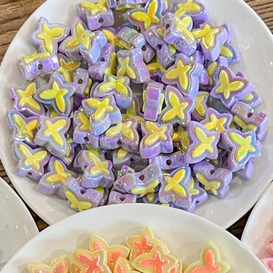 Detailed view of colorful butterfly resin beads for DIY hair accessories and jewelry making