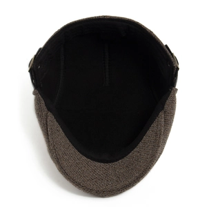 Dark brown tweed ivy cap with quilted lining and side buckle detail in top view