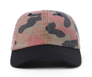 Detailed front view of pink camo baseball cap with black brim and metal eyelets