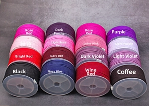 Close-up of colorful 2mm braided pineapple cords on 16 plastic reels for DIY jewelry making