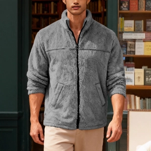 Men's grey sherpa fleece jacket with stand collar and zipper in a library setting