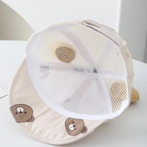 Detail view of baby sun hat showing breathable mesh lining and inner sweatband
