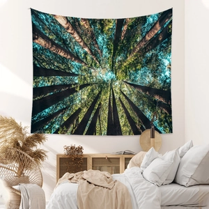 Bohemian forest tapestry featuring tall redwood trees and blue sky for bedroom wall decor