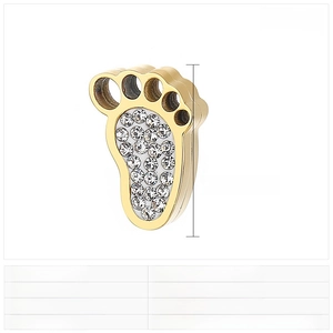 Macro detail of gold stainless steel paw pendant with white rhinestones and dimensions