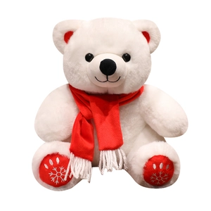 Cute polar bear plush toy with red scarf and snowflake patterns for Christmas gift
