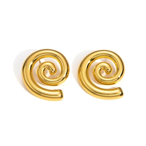 Macro shot of polished gold-toned spiral earrings showcasing a glossy metallic texture