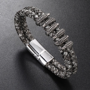 Men's retro braided leather bracelet with silver claw charms and magnetic clasp closure
