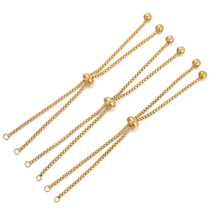 Close-up of golden vacuum plated adjustable box chains with slider beads for DIY jewelry