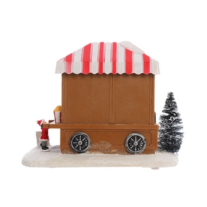 Detail of a Christmas popcorn cart ornament with mini figure and snowy base decoration