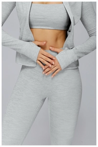 Detailed texture of heather grey brushed fabric on long sleeve zip-up athletic jacket