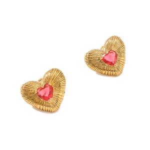 Golden heart-shaped stainless steel earrings with radiant texture and pink heart gemstones