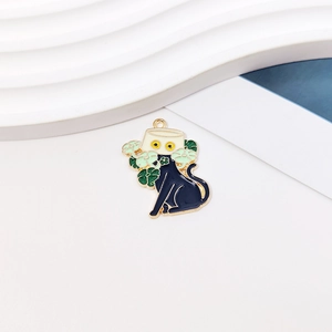 Detail of a DIY alloy cat charm featuring a black cat in a white flowerpot with gold edges