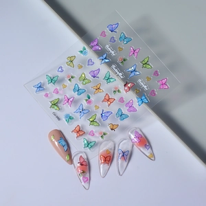 Colorful butterfly nail art stickers set with various sizes and floral accent designs