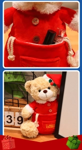 Detail of red Christmas bear plush with a large storage drawstring gift bag and gold lettering