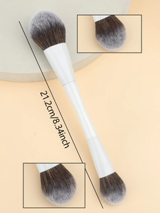 Detail view of double-ended makeup brush with soft bristles and dimensions of 21.2cm