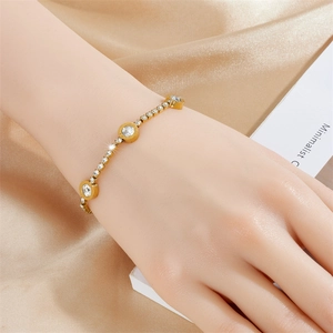 Elegant gold titanium steel bracelet with roman round pendants and sparkling crystals