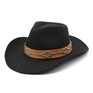 Close-up of black wool felt cowboy hat with silver studded brown leather band