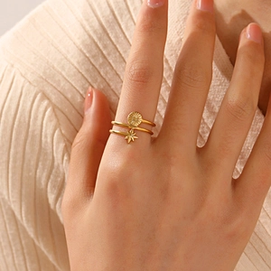 Three-layer gold stainless steel sunburst ring for women with celestial starburst texture