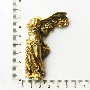 Golden Nike of Samothrace resin fridge magnet detail with ruler showing 7.5cm height