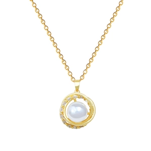 Rotating bird nest necklace with a white pearl and sparkling crystals in gold finish