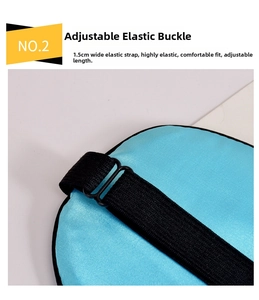 Detail of light blue silk sleep mask featuring 1.5cm adjustable black elastic strap