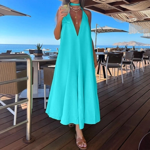 Turquoise deep V-neck halter maxi dress with backless design and flowing hemline