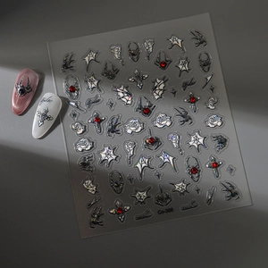 Gothic nail stickers featuring 3D spiders, metallic roses, and crystal cross designs