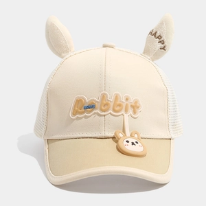 Detail of baby mesh cap featuring cute rabbit ears, embroidery and breathable texture