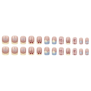 Sweet 24pcs press-on nails set featuring pearl accents, cherry patterns, and bows