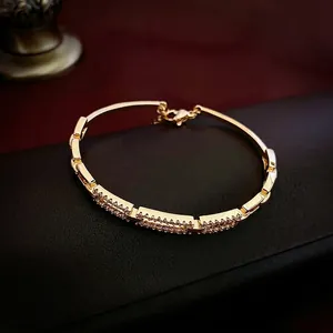 Luxurious gold-plated square link bracelet with pavé cubic zirconia and lobster clasp