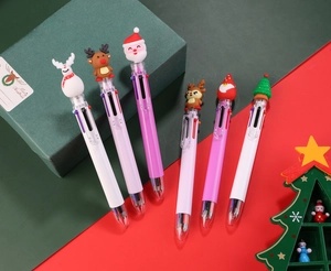 Detailed close-up of 6-color Christmas ballpoint pens with festive cartoon character toppers