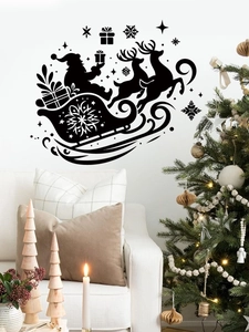 Black Christmas wall decals featuring Santa sleigh and reindeer above a sofa