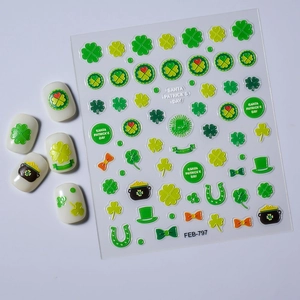 Detail of 5D embossed St. Patrick's Day nail stickers with green clover and gold coin patterns