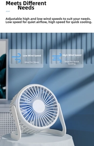 Close-up of white desktop USB fan with blue blades showing 2-speed adjustable settings
