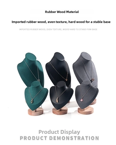 Detail view of microfiber necklace display busts with rubber wood bases in three colors