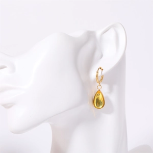 French vintage teardrop birthstone earrings in gold plated stainless steel on a model