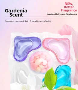 Close-up of 5-in-1 multi-effect laundry pods with concentrated fragrance beads