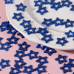 Detailed view of blue ABS star-shaped pearl beads for DIY craft decoration