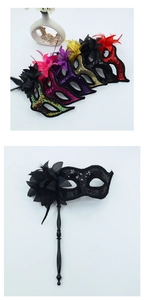 Close-up of sequin masquerade masks with decorative feathers and handheld handle sticks